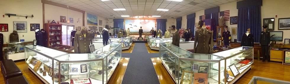 Uniforms and display cases inside the Mercer County War Museum